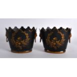 A SMALL PAIR OF TOLEWARE TIN TABLE PLANTERS highlighted in gilt with foliage. 5.5ins wide.