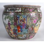 A MID 20TH CENTURY CHINESE CANTON FAMAILLE ROSE JARDINIERE painted with figures within interiors.