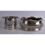 A VICTORIAN SILVER PLATED COASTER together with a larger silver plated coaster. 7Ins & 8.5ins