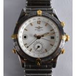 A GOOD BREITLING STAINLESS STEEL AND YELLOW GOLD GENTLEMANS WRISTWATCH. No B15047. 1.5ins diameter.