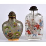 AN EARLY 20TH CENTURY CHINESE REVERSE PAINTED SNUFF BOTTLE together with an unusual plique a jour
