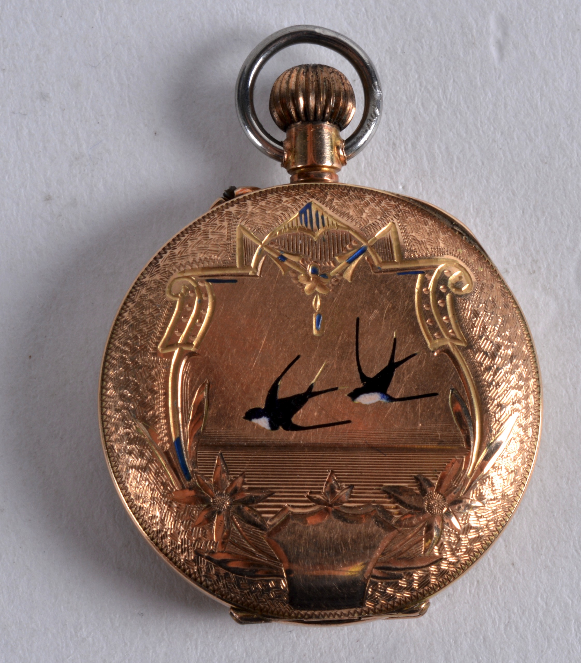 AN EDWARDIAN 9CT YELLOW GOLD AND ENAMEL FOB WATCH. 1.25ins diameter. - Image 2 of 3