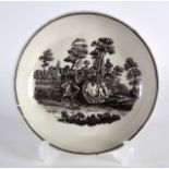 AN 18TH CENTURY WORCESTER SAUCER printed with a scene of lovers after Hancock. 5Ins diameter.