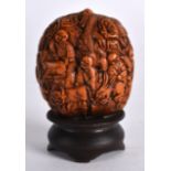 A LATE 19TH CENTURY CHINESE CARVED CANTON NUT formed with various characters and beasts. Nut 1.