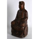 A 17TH/18TH CENTURY CHINESE CARVED WOOD FIGURE OF AN IMMORTAL modelled holding a prayer block,