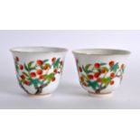 A PAIR OF CHINESE FAMILLE ROSE TEABOWLS 20th Century, bearing Guangxu marks to base, painted with