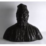 Russian School (C1920) A Huge bronze bust of a male, boldly modelled wearing a robe with incised