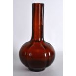 A 19TH CENTURY CHINESE AMBER PEKING GLASS VASE bearing Qianlong marks to base, of lobed form. 10.