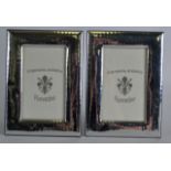 A PAIR OF ITALIAN SILVER PHOTOGRAPH FRAMES. 5Ins x 7ins.