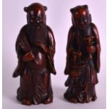 A FINE PAIR OF CHINESE QING DYNASTY CARVED BAMBOO FIGURES of unusually small proportions, modelled