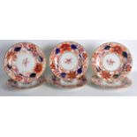 A SET OF SIX EARLY 19TH CENTURY FLIGHT BARR AND BARR PLATES painted with imari tones. 8Ins diameter.