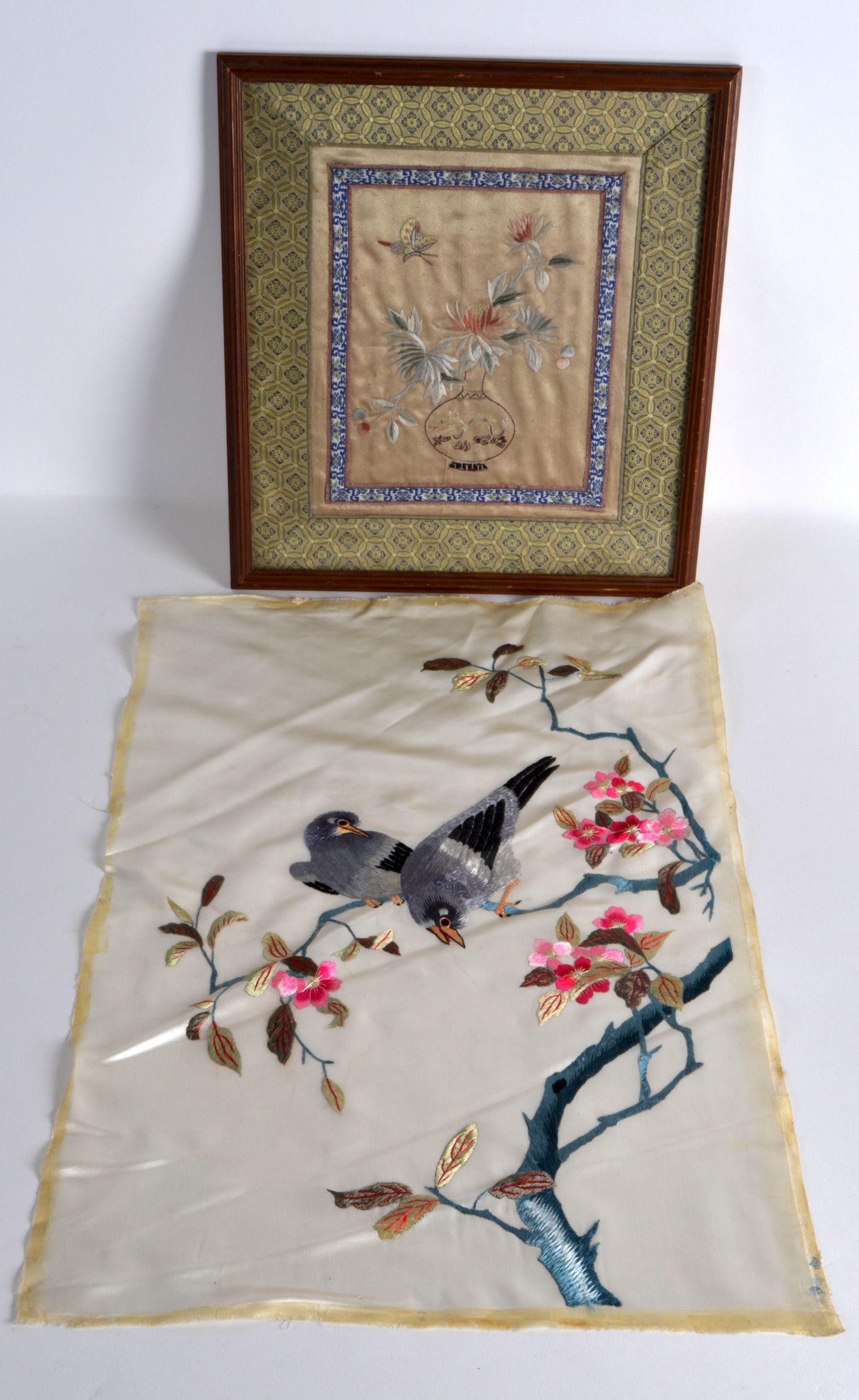 A CHINESE REPUBLICAN PERIOD SILK PANEL decorated with birds, together with a framed silkwork panel