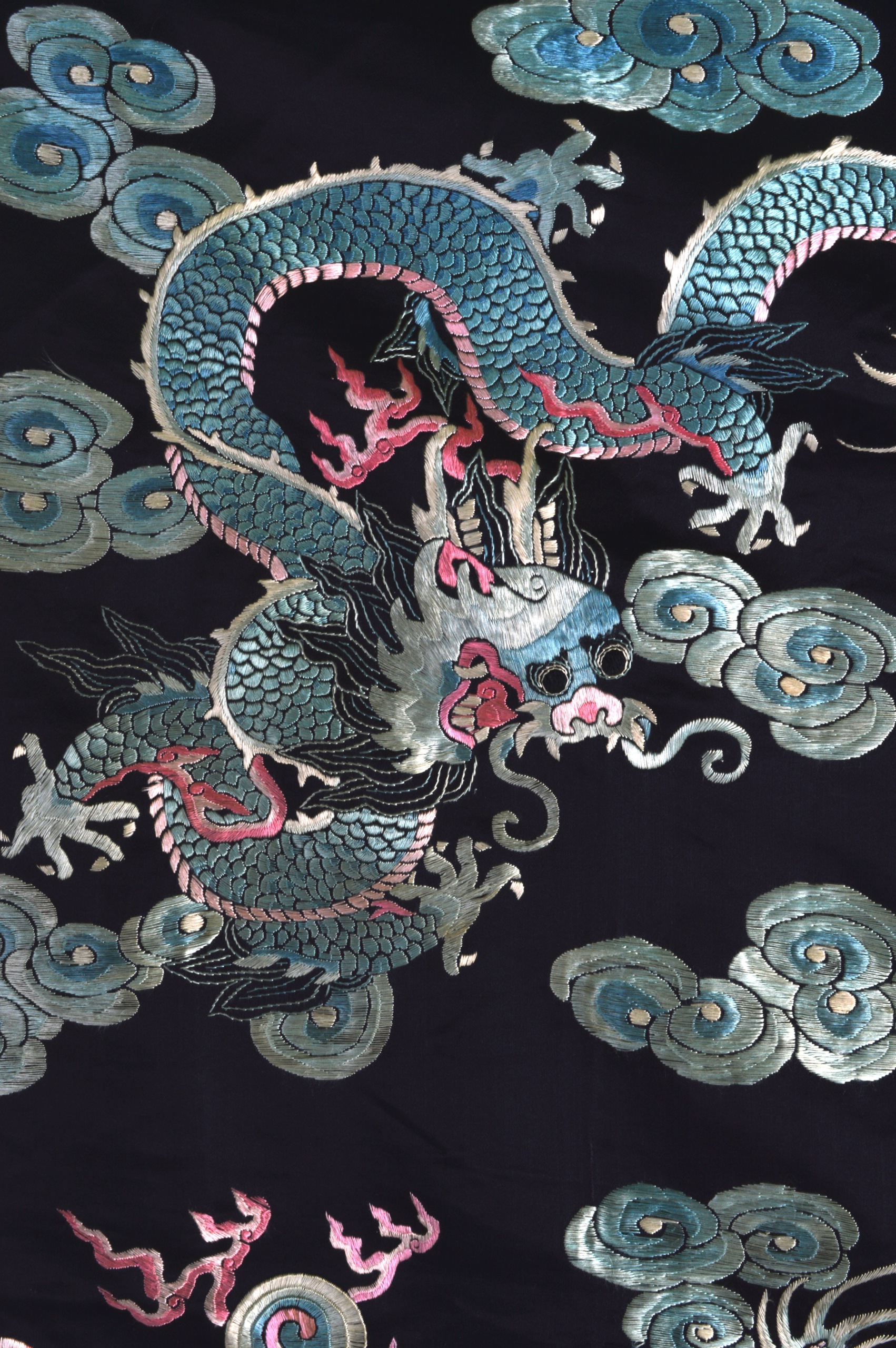 A 19TH CENTURY CHINESE BLUE SILKWORK RECTANGULAR PANEL decorated with a central five claw dragon - Image 3 of 3