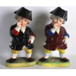 A PAIR OF 19TH CENTURY STAFFORDSHIRE FIGURES OF GENTLEMAN one with a removable cover, each