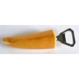 AN EARLY 20TH CENTURY ASPREYS OF LONDON IVORY BOTTLE OPENER C1910. 6Ins long.