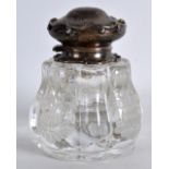 A VICTORIAN SILVER MOUNTED HEAVY GLASS INKWELL decorated with flowers. 4.25ins high.