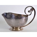 A STYLISH GEORG JENSEN SILVER SAUCEBOAT probably designed by Johan Rohde, of elegant form with