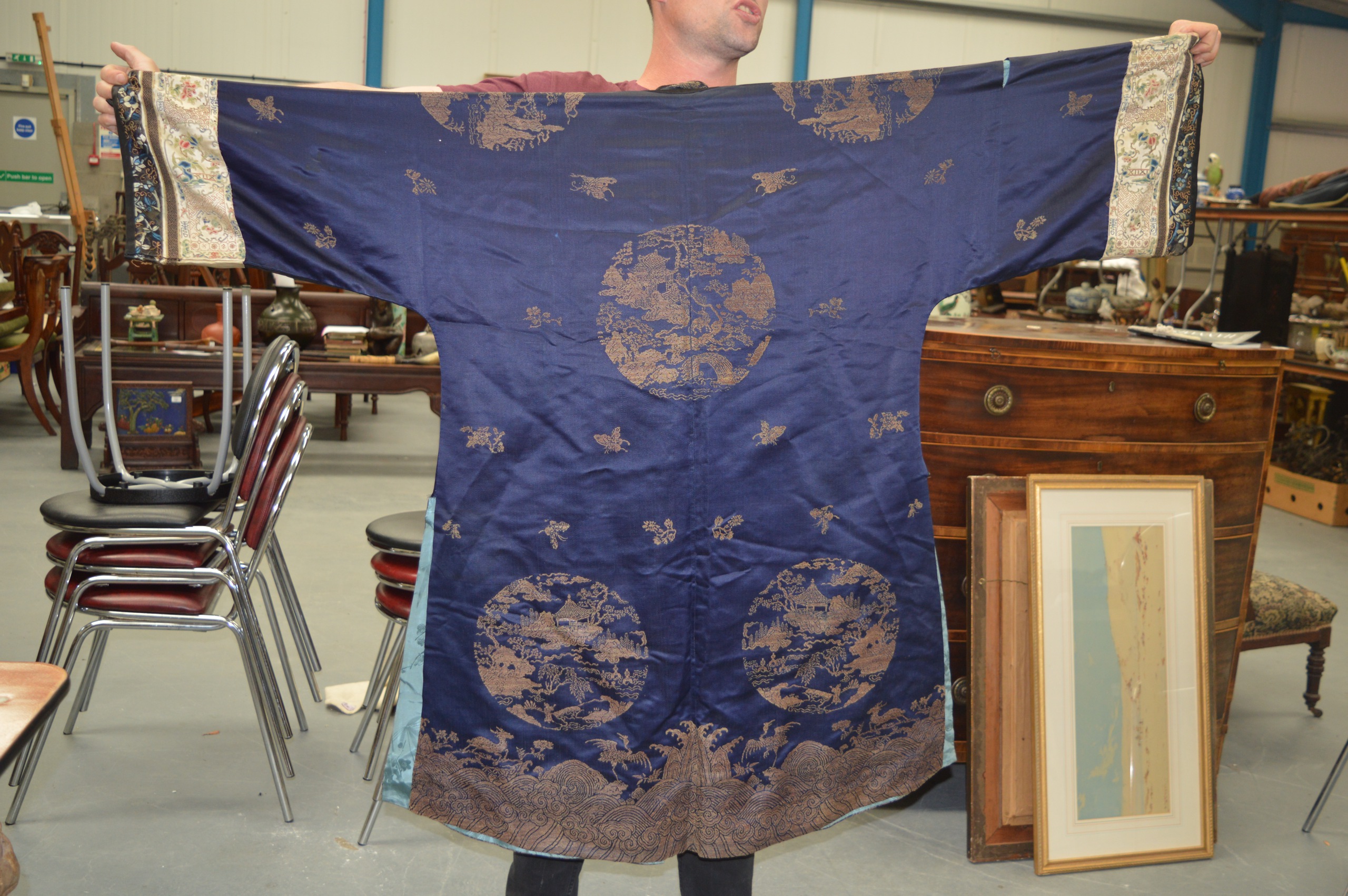 AN UNUSUAL 19TH CENTURY CHINESE BLUE SILKWORK ROBE decorated with insects and landscapes, the - Image 4 of 8