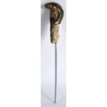 AN EARLY 20TH CENTURY EUROPEAN CARVED HORN LETTER OPENER in the form of a fish. 7.5ins long.