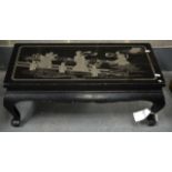 AN EARLY 20TH CENTURY CHINESE LACQUERED HARDWOOD LOW TABLE decorated with females amongst clouds.