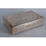 A 1950S BRONZE AND STERLING SILVER MOUNTED CIGAR BOX. 9.25ins wide.