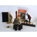 A PAIR OF VINTAGE MILITARY BINOCULARS together with a hand bell, brass golfing figure etc. (qty)