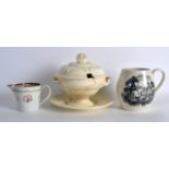 AN EARLY 19TH CENTURY CREAMWARE TUREEN AND COVER ON STAND together with a mug & another. (3)