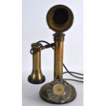 A VINTAGE BRASS TELEPHONE. 1Ft 1ins high.