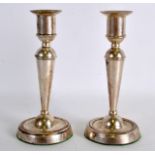 A PAIR OF LATE 19TH CENTURY HALLMARKED MALTESE SILVER CANDLESTICKS. 6Ins high.