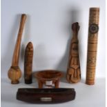 A CARVED POLYNESIAN BLEEDING BOWL together with five other carved utensils. (6)