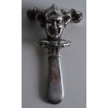 A SILVER 'JESTER' RATTLE.