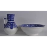 AN ARTS AND CRAFTS MINTON POTTERY JUG AND BASIN designed by Christopher Dresser. Bowl 9ins diameter.