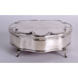 A 1930S ENGLISH SILVER DRESSING TABLE BOX with scrolling form. Birmingham 1916. 5.5ins wide.