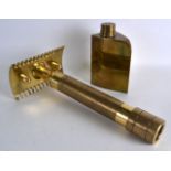 A LOVELY NOVELTY VICTORIAN HEAVY BRASS SHOP DISPLAY RAZOR together with a matching brass jar.