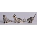 A SET OF THREE SILVER MINIATURE GEM INSET CAT FIGURES.