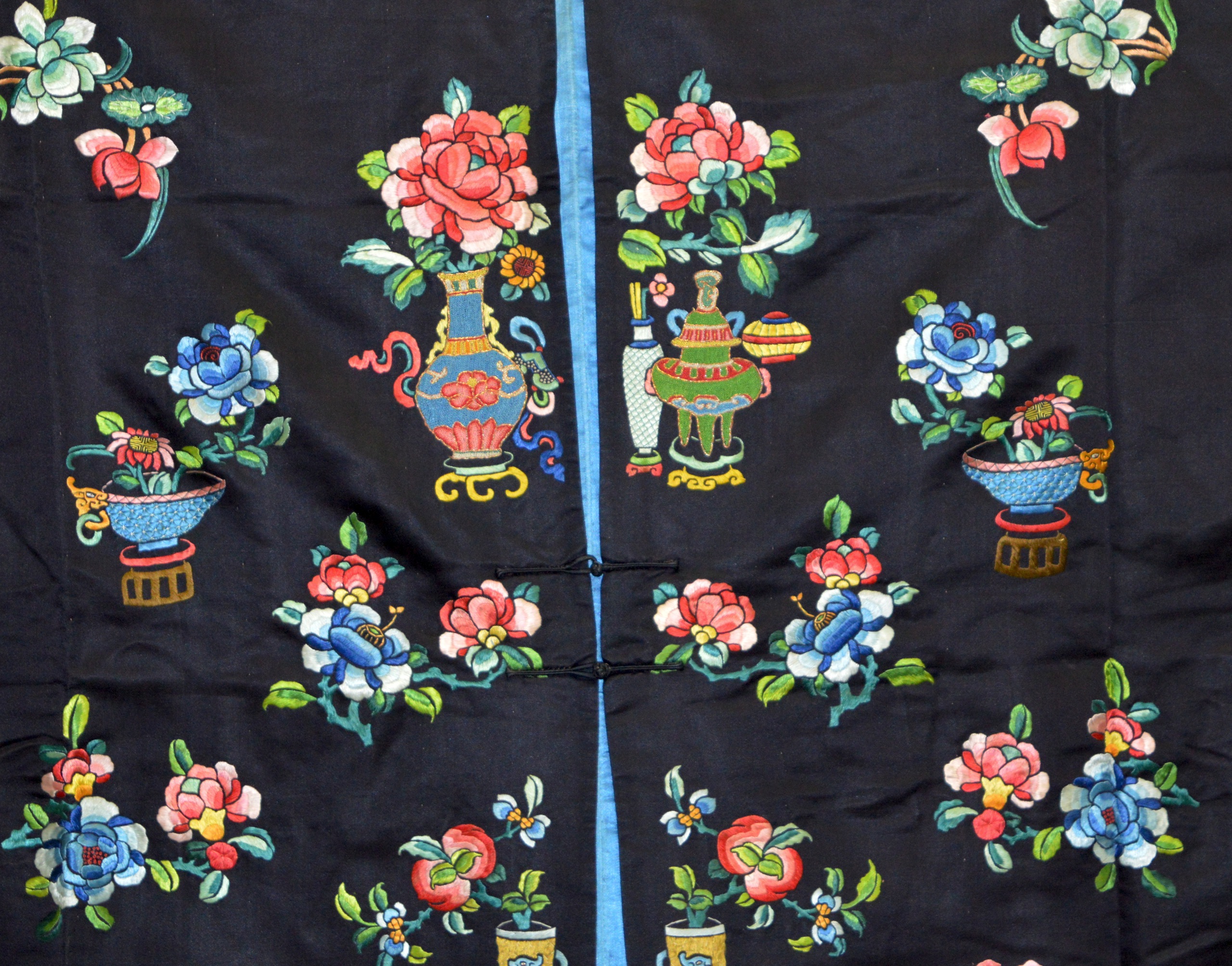 A FINE 19TH CENTURY CHINESE BLUE SILKWORK ROBE decorated in bright colours with flowers, motifs - Image 2 of 4