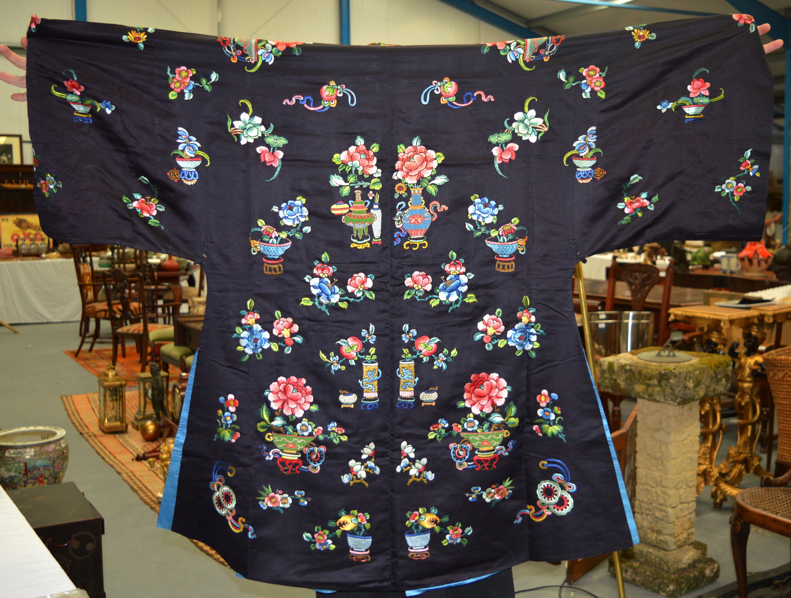 A FINE 19TH CENTURY CHINESE BLUE SILKWORK ROBE decorated in bright colours with flowers, motifs - Image 4 of 4