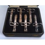 A LOVELY SET OF CASED ANTIQUE ASPARAGUS TONGS.