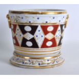 AN EARLY 19TH CENTURY SPODE CACHE POT ON STAND painted with diamond shaped panels. 4.75ins high.