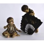 A RARE EARLY 20TH CENTURY VIENNA COLD PAINTED BRONZE FIGURAL GROUP depicting a boy peering over a