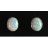 A PAIR OF 9CT GOLD AND OPAL STUD EARRINGS.