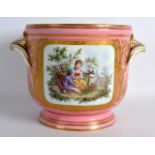 A MID 19TH CENTURY SEVRES STYLE TWIN HANDLED CACHE POT painted with panels of birds upon a pink