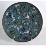 A 19TH CENTURY JAPANESE MEIJI PERIOD CLOISONNE ENAMEL PLATE painted with cranes amongst foliage. 9.