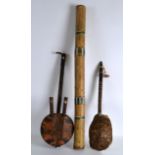 A VINTAGE CHILEAN RAINMAKER together with a carved tortoiseshell instrument & an African Kora. (3)
