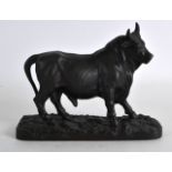 A 19TH CENTURY FRENCH CAST IRON FIGURE OF A BULL. 6.25ins wide.