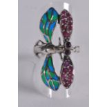 A SILVER RUBY PLIQUE ENAMEL DRAGONFLY RING.