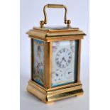 A MINIATURE FRENCH BRASS CARRIAGE CLOCK inset with later Sevres porcelain panels, depicting