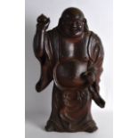 A LARGE 19TH CENTURY CHINESE STONEWARE POTTERY MODEL OF A BUDDHA modelled jovial holding aloft a