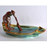 A GOOD ZSOLNAY PECS HUNGARIAN LUSTRE FIGURAL GROUP depicting a female fetching water from an open