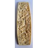 AN EARLY 20TH CENTURY CHINESE CARVED IVORY PANEL Qing, decorated in relief with figures working in